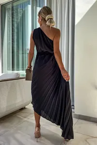 Back view of an elegant black one-shoulder pleated dress with irregular hem on a model