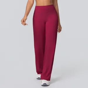 High-waisted wide-leg yoga pants in burgundy showing soft drape and comfortable flowy fit