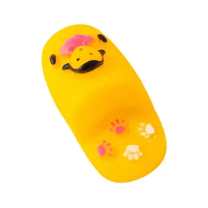 Durable yellow shoe-shaped squeaky pet chew toy for dogs with cute cartoon cow pattern