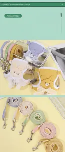 Dettaglio dell'imbracatura per animali con orsetto cartoon e fiocco in pizzo