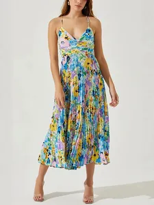 Vibrant floral V-neck pleated maxi dress with spaghetti straps, perfect for beach and summer.