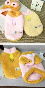 Close-up detail of soft fleece pet sweater with BUNNY patch and leash attachment D-ring