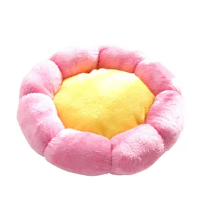 Soft flower-shaped plush pet bed for cats and dogs in vibrant pink and yellow colors