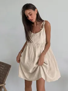 Elegant beige cotton linen camisole dress for women perfect for summer beach vacations
