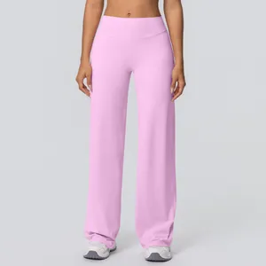 Detailed view of pink high-waisted wide-leg yoga pants for fitness and running