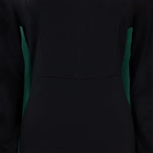 Macro view showing the waistline seam and fabric texture of this black long-sleeve dress