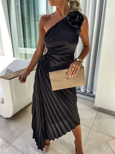 Elegant one-shoulder pleated black midi dress with rose detail and side cutout for party.