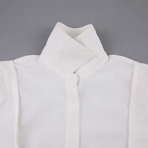 Detail of white pure cotton French style shirt with unique high collar design