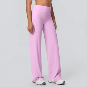 Side view of pink high-waisted flare yoga pants showing loose breathable brushed fabric