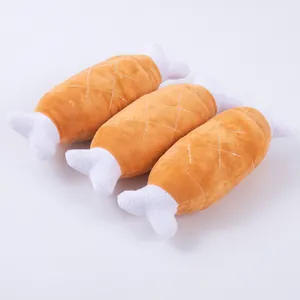 High-detail macro view of three squeaky plush chicken leg toys for dogs and cats