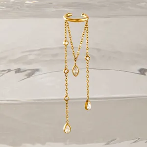 Detail showing gold stainless steel ear cuff with sparkling teardrop tassel chains