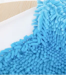 Vista macro detallada de la tela de fibra de chenilla azul altamente absorbente para mascotas
