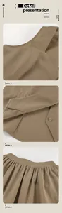 Detail of khaki cotton linen vest and skirt set showing fabric texture and finish