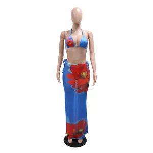 Floral print three-piece bikini swimwear set with a matching long blue mesh cover-up skirt