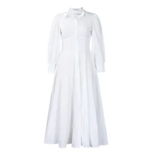 Vestido camisero blanco elegante de manga larga con un detalle de falda larga chic