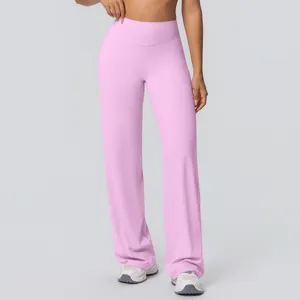Close-up of pink high-waisted wide-leg yoga pants with brushed fabric texture