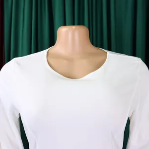 Detailed close-up view of elegant white round neck long sleeve dress bodice section