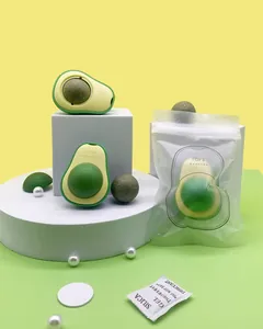 Detailed view of the avocado-shaped rotating catnip ball toy with protective packaging