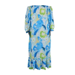 Full-length view of an off-the-shoulder maxi dress with vibrant blue and green floral prints