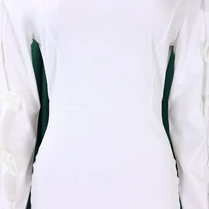 Detailed close-up showing the waistline and bow sleeve accents of this elegant white dress