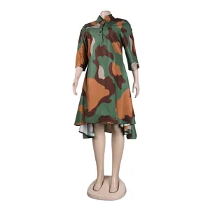 Detail of a camo print dress with lapel collar and asymmetrical high-low hemline.