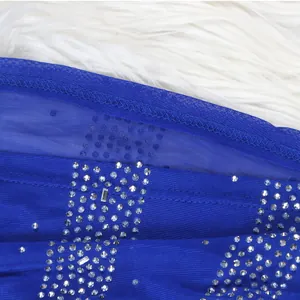 Detailed view of sparkling silver rhinestones on sheer blue mesh sexy evening gown