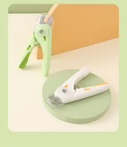 Close-up of LED pet nail clippers for dogs and cats with built-in safety guard