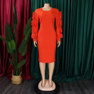 Detail view of stylish orange plus size bodycon dress featuring ruffle sleeves decor