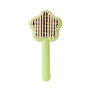 Brosse autonettoyante mignonne en forme d'étoile pour chats avec aiguilles inox