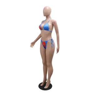 Side view of floral print blue bikini on mannequin from three-piece swimwear set