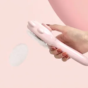 Pink bear-shaped pet grooming brush with one-click hair removal feature