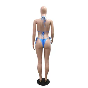 Rear view of a sexy light blue string bikini swimwear set on a mannequin display.