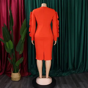 Detailed back view of an elegant orange long sleeve bodycon dress with layered ruffle sleeves