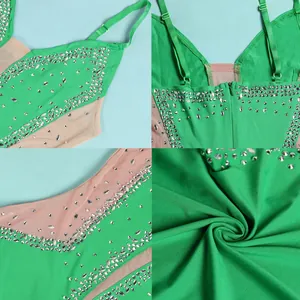 Close-up of sparkling rhinestones and sheer mesh on a green camisole evening dress