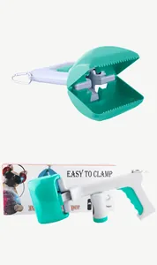 Close-up of portable pet poop scooper featuring a clamp jaw and retail box packaging.