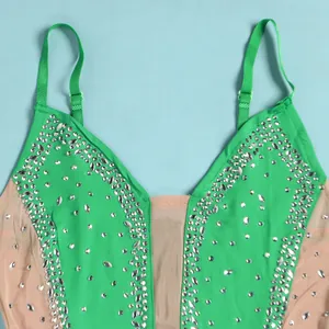 Detail view of green sexy camisole dress featuring elegant rhinestones and sheer mesh panels