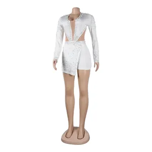 Tutina sexy bianca trasparente a maniche lunghe con strass e decorazioni di perle