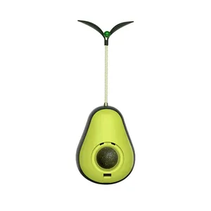 Avocado tumbler cat toy featuring a catnip ball and treat dispenser on white background.