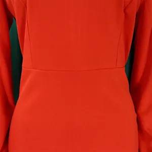 Macro view of the waist stitching on this elegant red long-sleeve dress fabric.