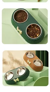 Vue détaillée des bols doubles pour animaux avec nœud papillon et inserts en acier inoxydable.