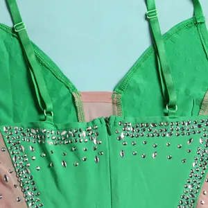 Detail view of green evening dress with silver rhinestones and invisible zipper