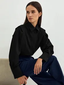 Minimalist black long-sleeved French cotton shirt for professional women office wear