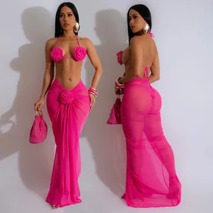 Side and front view detailing the 3D floral motifs on this pink mesh three-piece set.