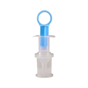 Blue syringe-style pet feeder and pill popper for dogs and cats on white background