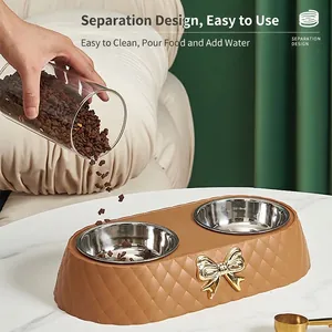 Double mangeoire élégante pour animaux avec bols en inox et décoration nœud doré
