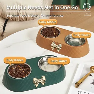 Double bol pour animaux avec inserts en inox et nœuds décoratifs dorés élégants