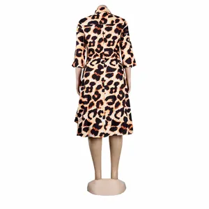 Detailed back view of a slim fit leopard print midi dress featuring a lapel collar