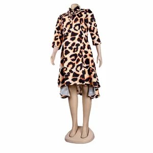 Full view of the stylish leopard print dress displayed on a fashion mannequin prop