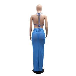 Back view of blue three-piece bikini set with sheer maxi skirt on mannequin