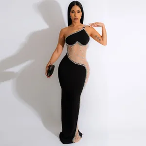Vestito da sera sexy aderente con dettagli in perle strass e rete trasparente